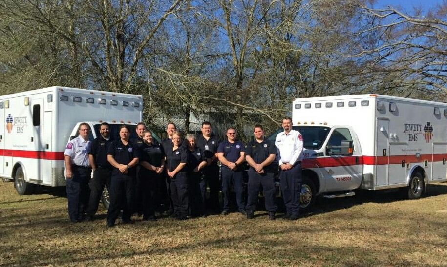 Paramedics Assisting Patient